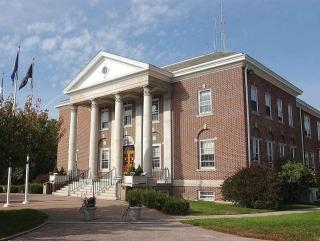 File photo: Stonington Town Hall. Not a photograph of the meeting, voting activity or policy action described.